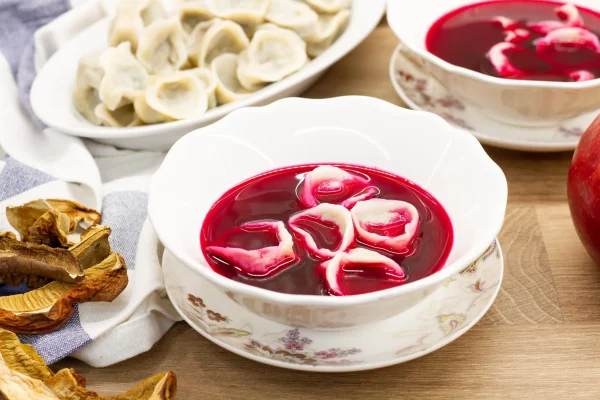 Borscht Recipe: Energize, Enjoy This Incredible Soup Bowl of vibrant borscht garnished with sour cream and dill