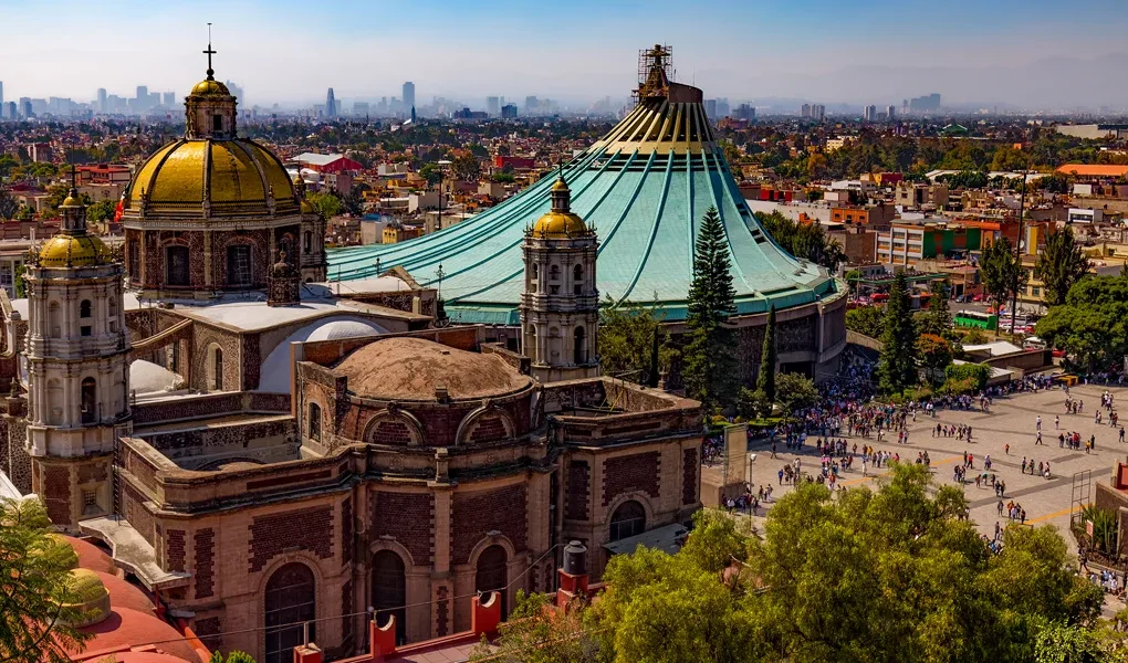 The Old Basilica's twin bell towers and elaborate Renaissance facade.